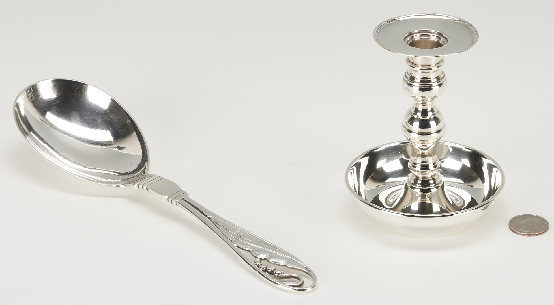 Lot 1104: 2 Sterling Silver Items, Mexican Candlestick & Georg Jensen Serving Spoon