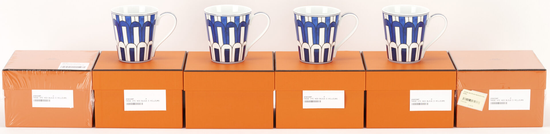 Lot 1152: 6 Hermes Bleus D'Ailleurs Printed Porcelain Mugs