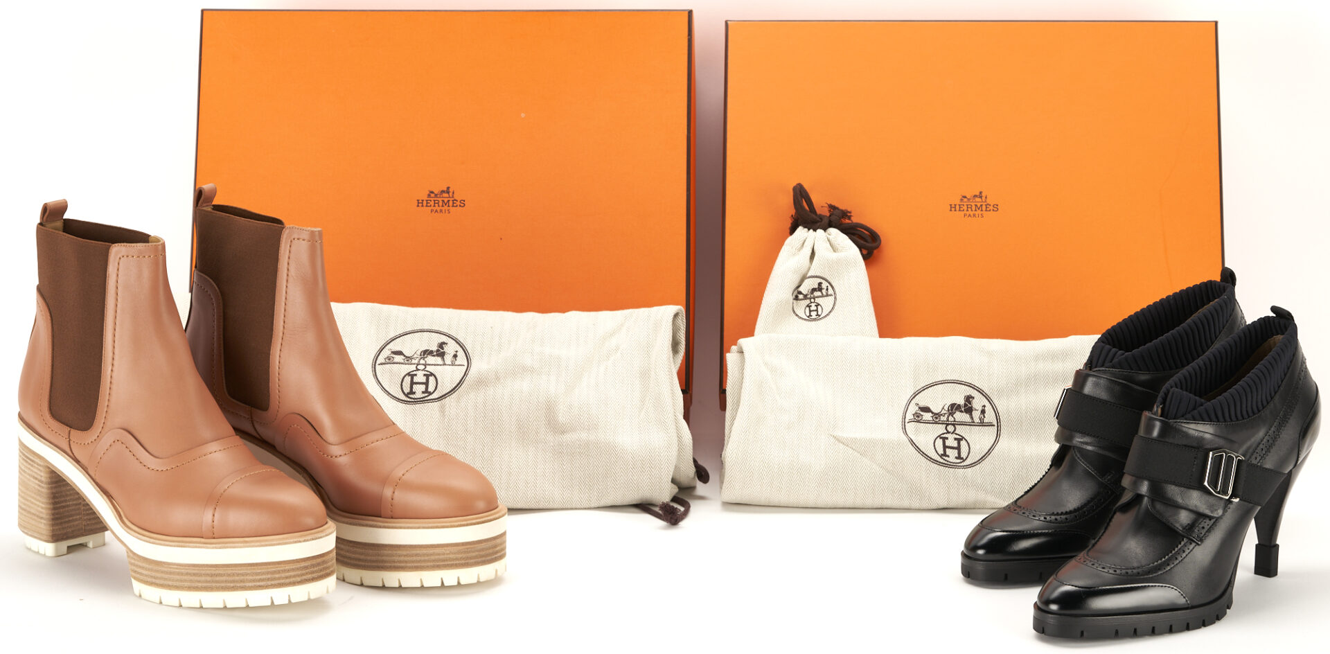 Lot 1170: 2 Pairs Hermes Calfskin Booties, incl. Punchy Ankle Boots