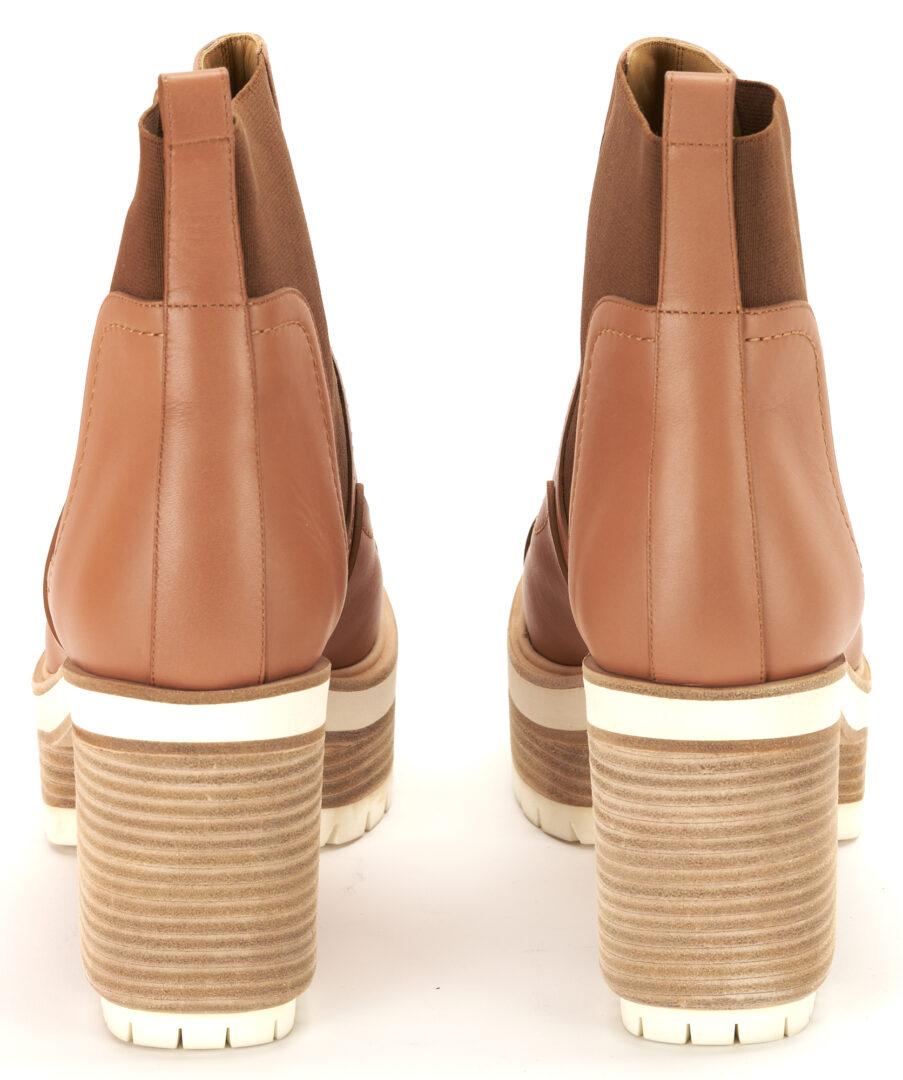 Lot 1170: 2 Pairs Hermes Calfskin Booties, incl. Punchy Ankle Boots