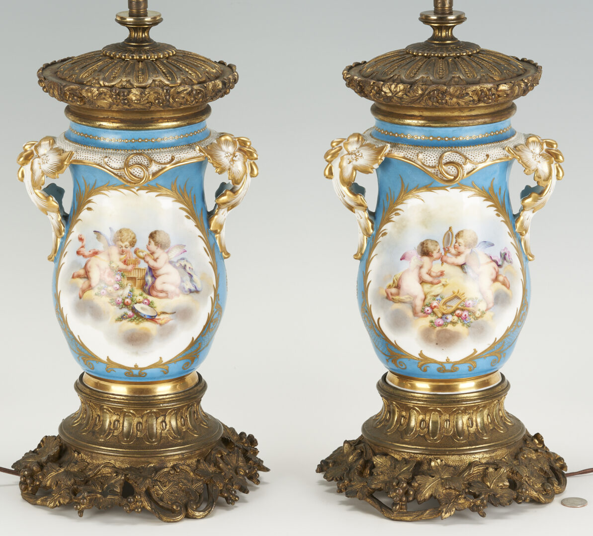 Lot 225: Pair of Sevres Style Porcelain Urns, Mounted as Lamps