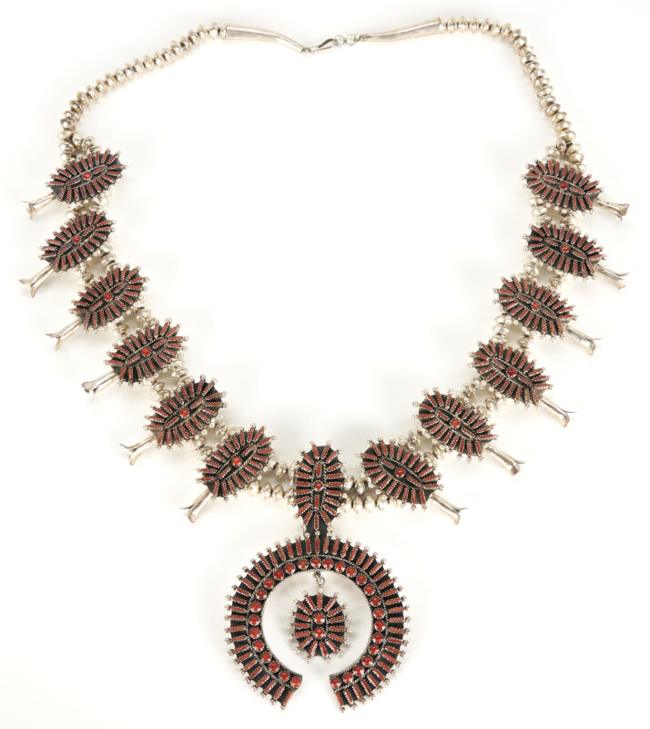 Lot 537: Navajo Needlepoint Coral & Silver Squash Blossom Necklace, possibly Delbert Chatter