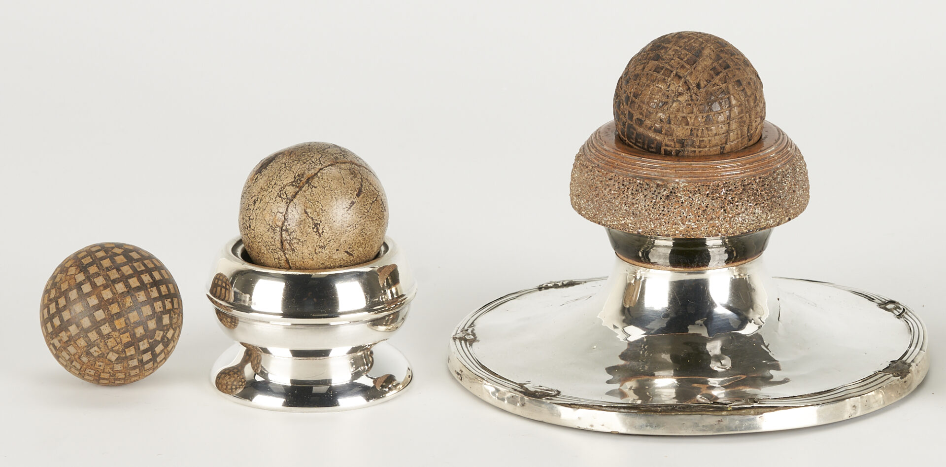 Lot 628: Collection of 5 Antique Golf / Chole Balls, 3 Stands
