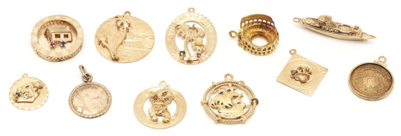 Lot 686: 18K, 14K, and 10K Yellow Gold Charms, Total 10
