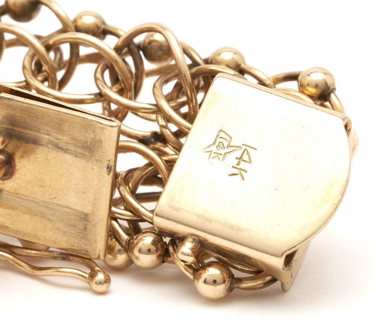 Lot 687: 14K Yellow Gold Charm Bracelet