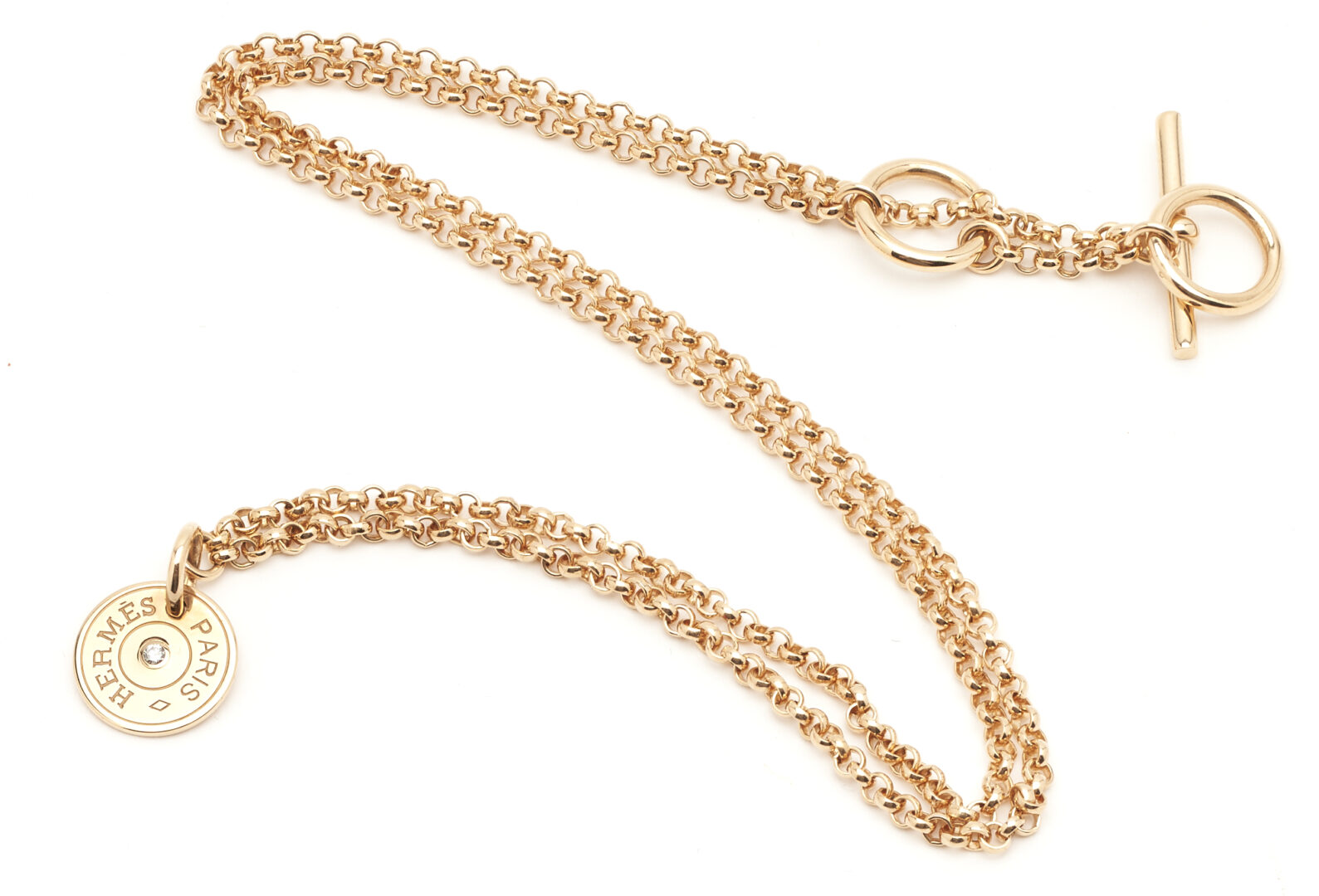 Lot 708: Hermes 18K Rose Gold Clou de Selle Motif Gambade Diamond Necklace