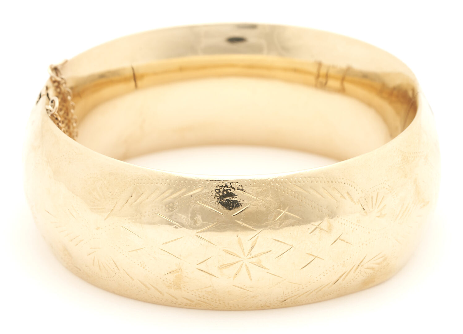 Lot 769: Ladies' Engraved 14K Gold Bangle Bracelet