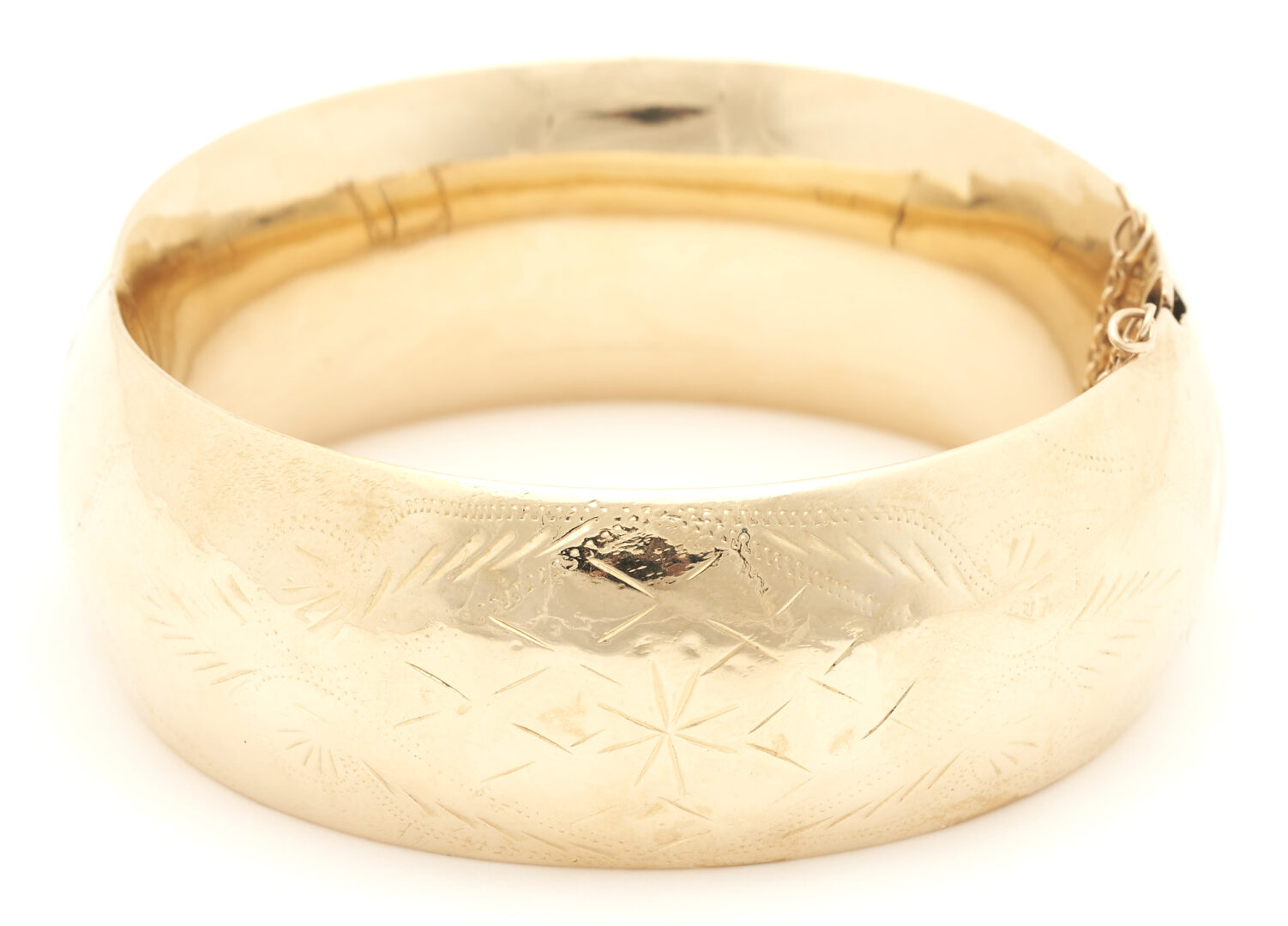Lot 769: Ladies' Engraved 14K Gold Bangle Bracelet