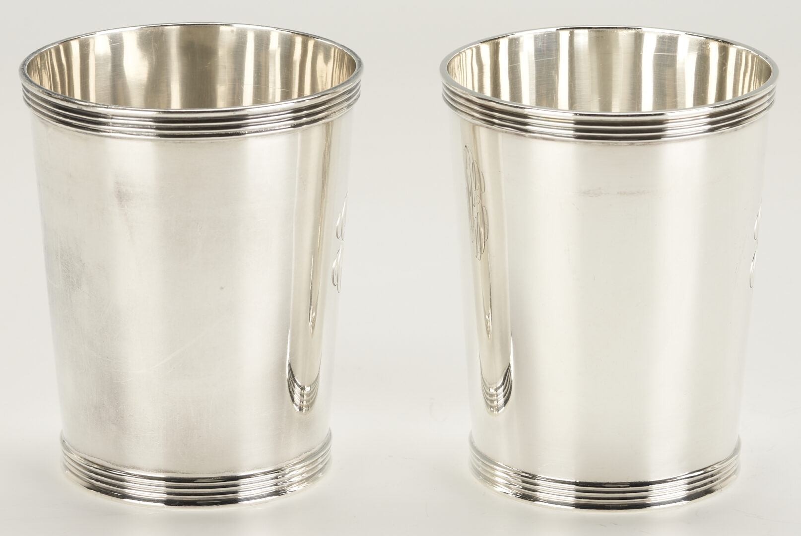 Lot 77: 7 Frank Smith Sterling Julep Cups Retailed by Bogaert, Lexington