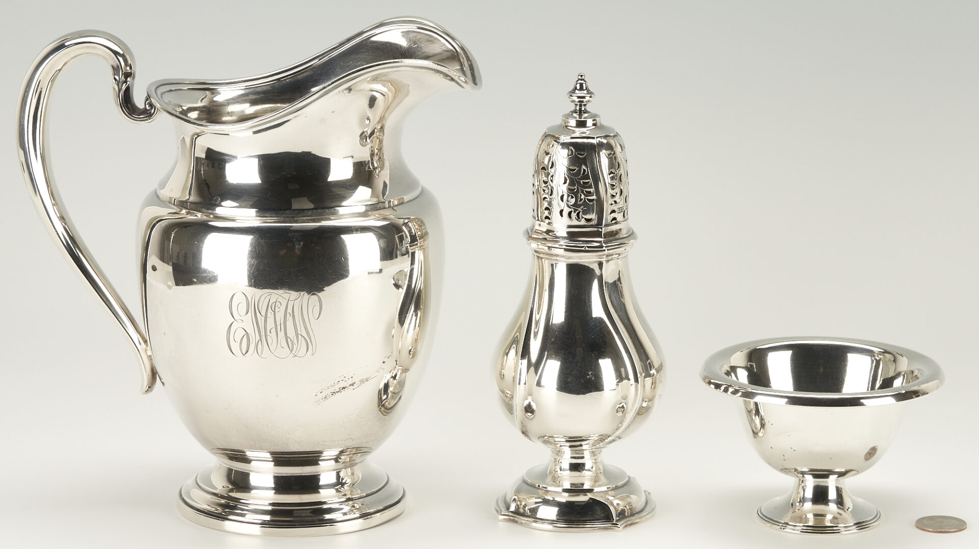 Lot 784: 3 pcs Sterling Silver Hollowware: Pitcher, Caster and Compote