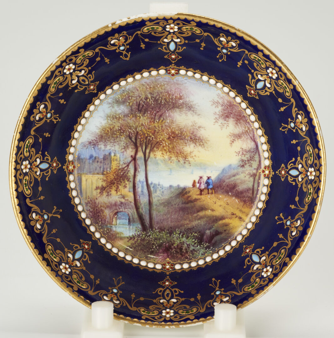 Lot 859: 4 French Porcelain Items inc. Sevres Cup and Saucer, 2 Scenic Plates