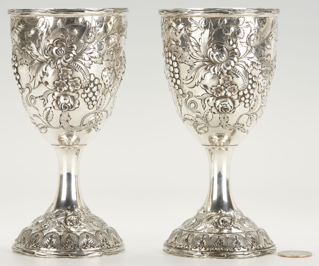 Lot 935: 2 Sterling Silver Repousse Water Goblets by Baltimore Silversmiths Mfg. Co.