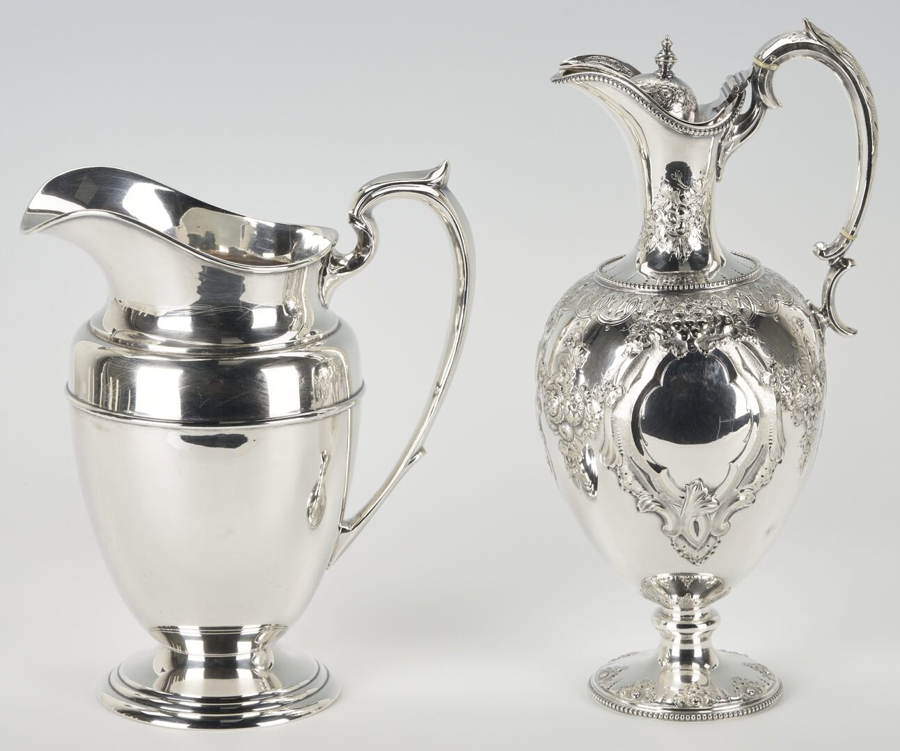 Lot 936: Sterling water pitcher and Victorian wine funnel and Ewer