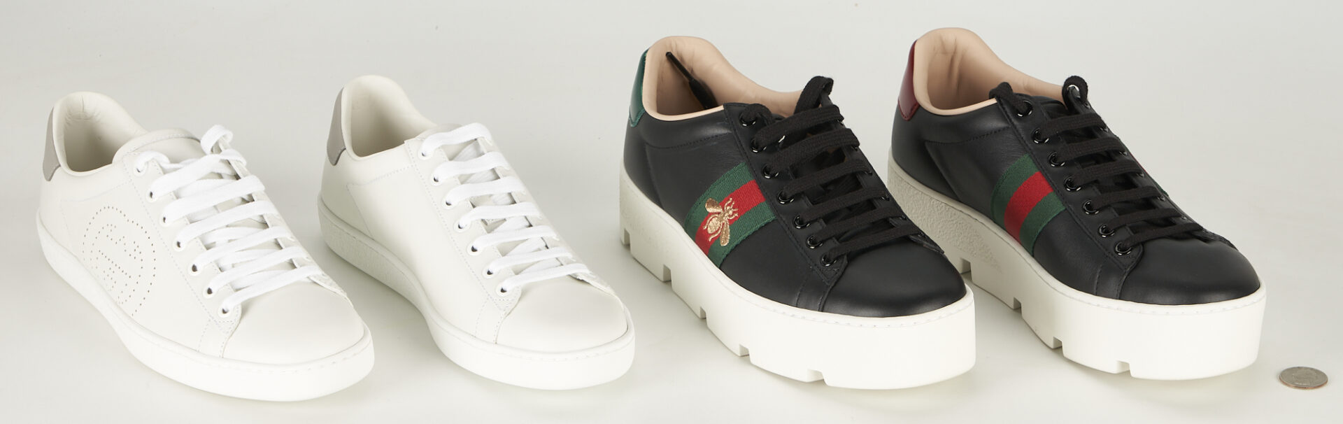Lot 102: 2 Pairs of Gucci Ace Leather Sneakers