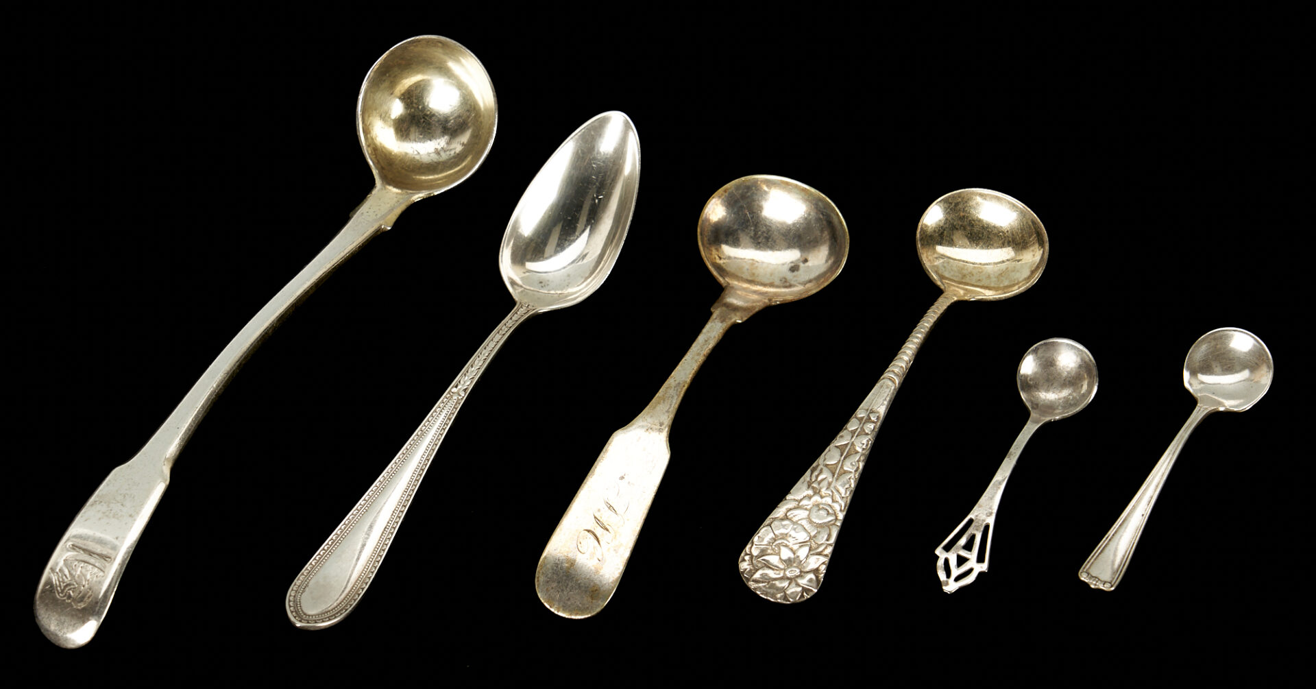 Lot 181: 22 Silver Items: Sterling Ladle, 16 Spoons & 5 Corn Holders/Skewers