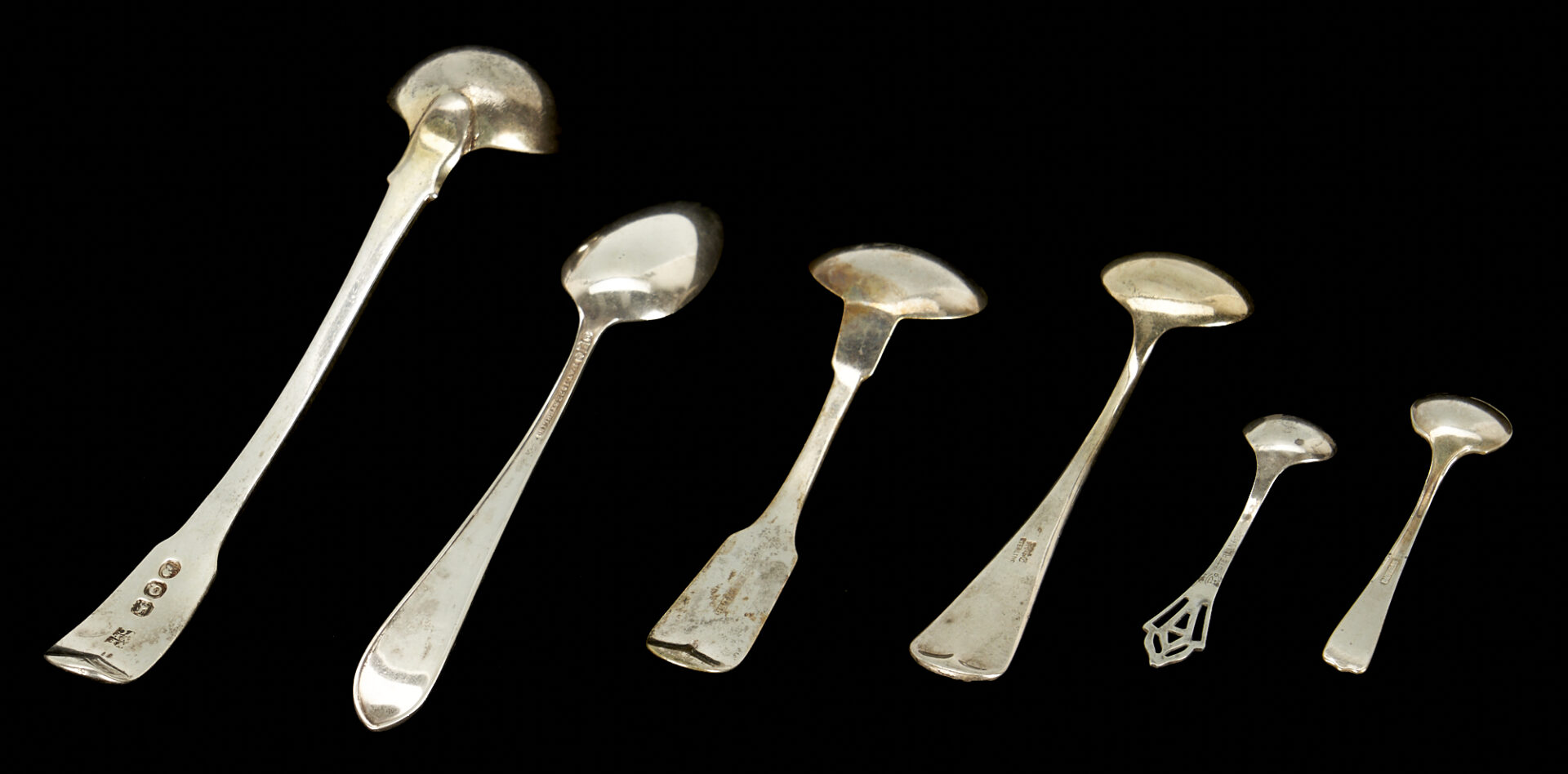 Lot 181: 22 Silver Items: Sterling Ladle, 16 Spoons & 5 Corn Holders/Skewers