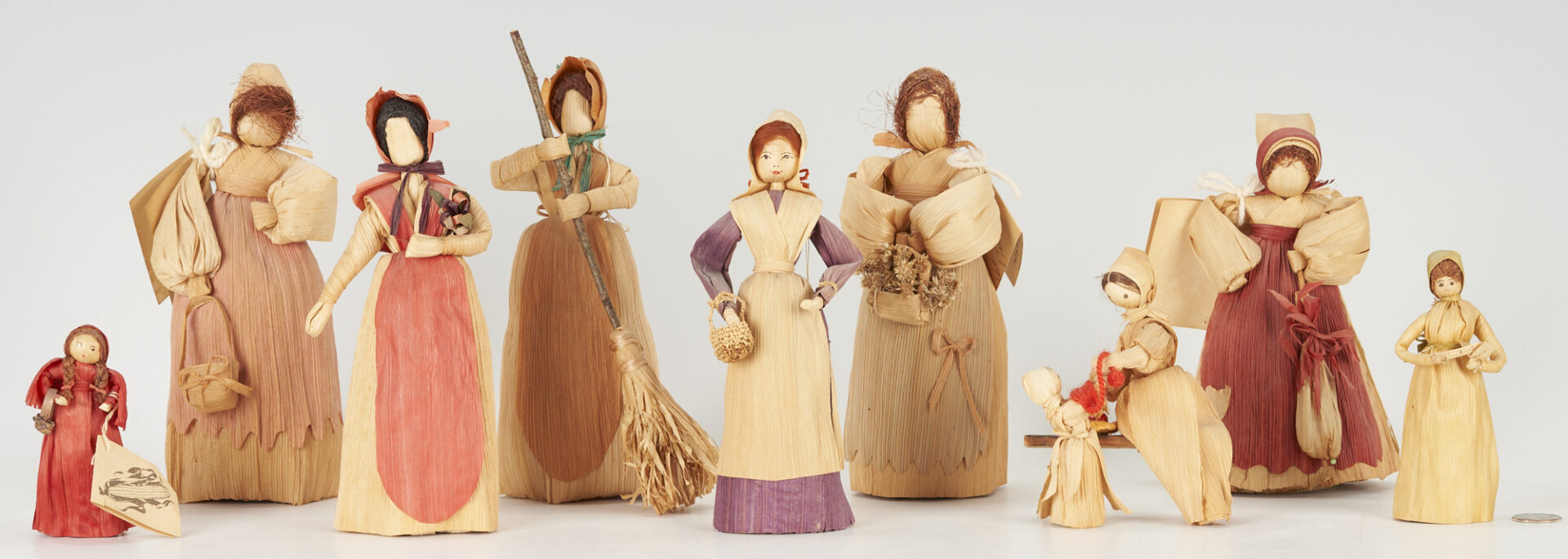 Lot 300: 12 Brasstown Wood Carvings & 9 Folk Art Corn Husk Dolls