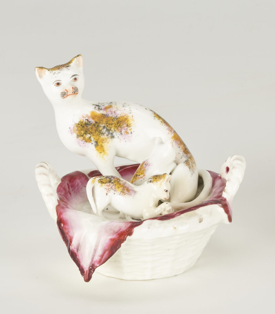 Lot 359: Staffordshire Cat plus Porcelain Cachepot, Lovers at Well (2 items)