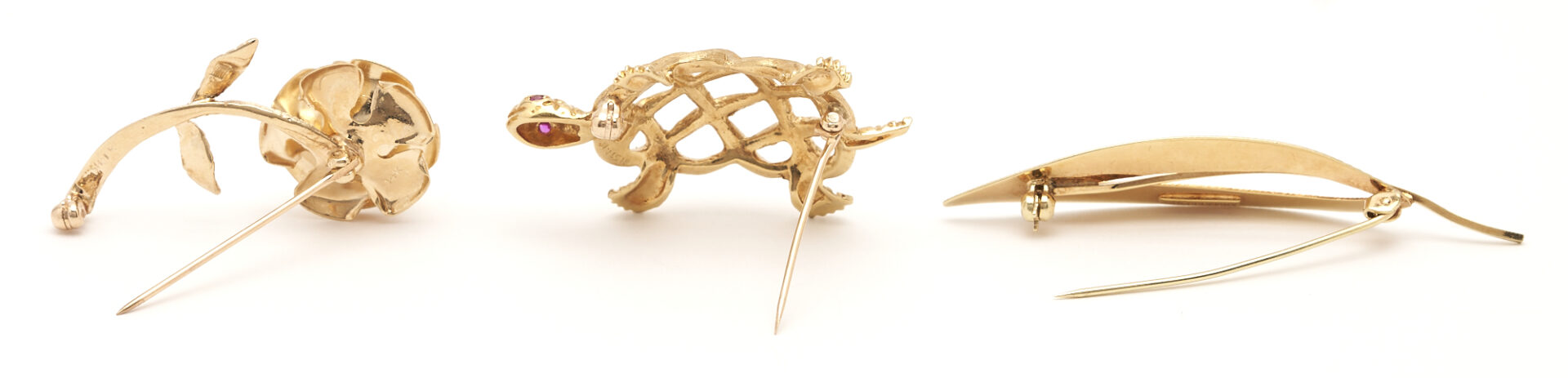 Lot 421: 3 Ladies' Gold Brooches: Flower, Turtle and Leaf forms