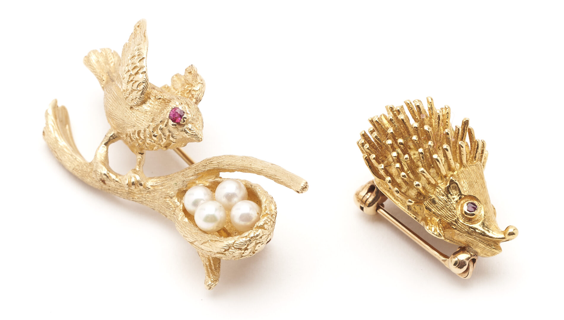 Lot 428: 2 Yellow Gold & Gemstone Bird and Hedgehog Brooches, 18K and 14K