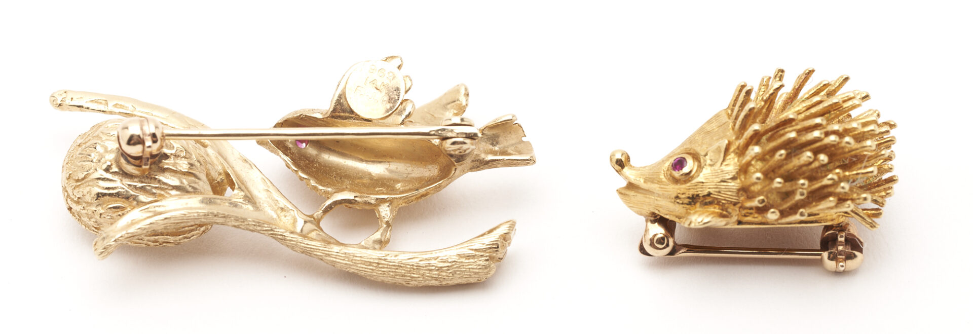 Lot 428: 2 Yellow Gold & Gemstone Bird and Hedgehog Brooches, 18K and 14K