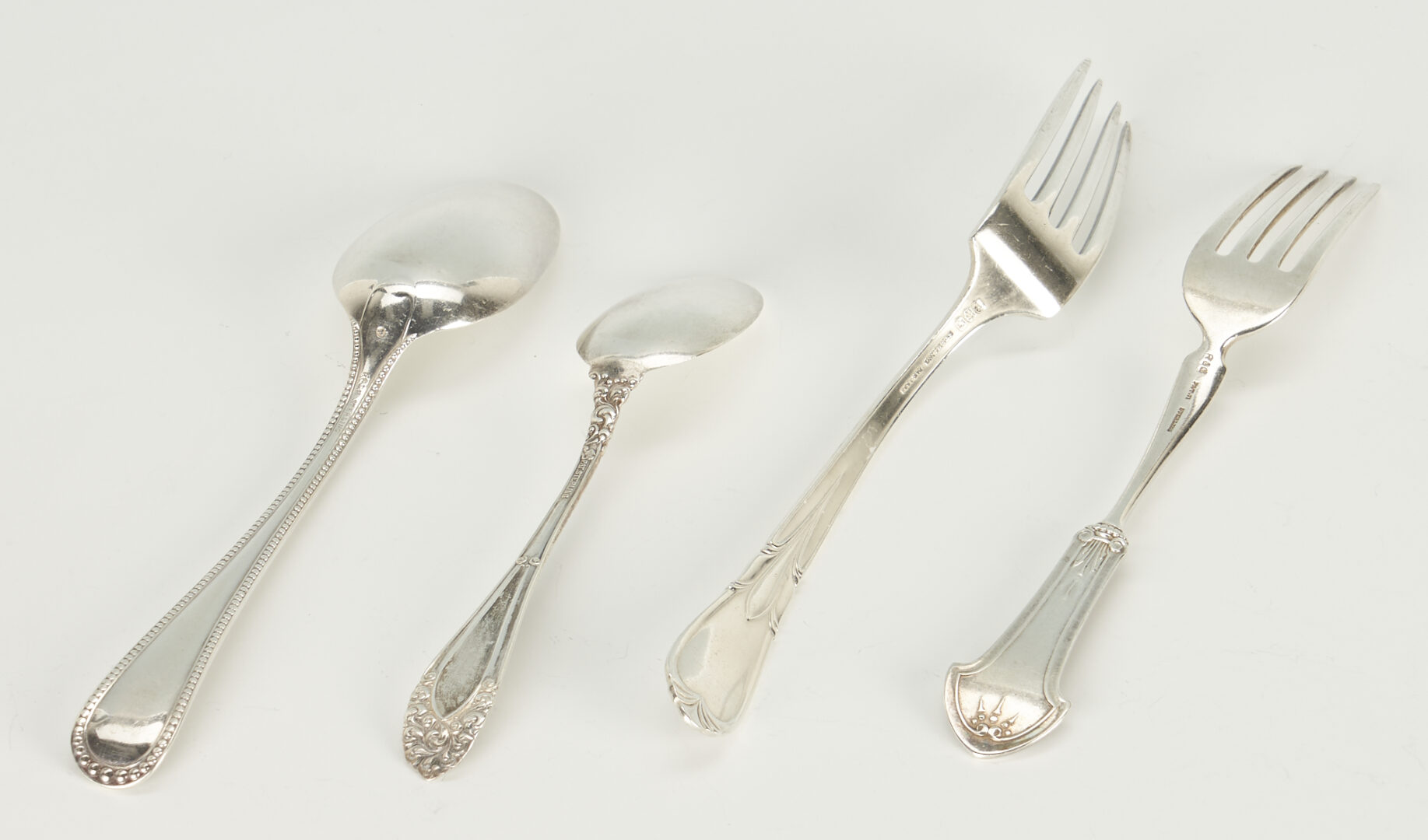 Lot 440: 47 Assorted Sterling Items incl. Burgundy Flatware, Christmas Ornaments