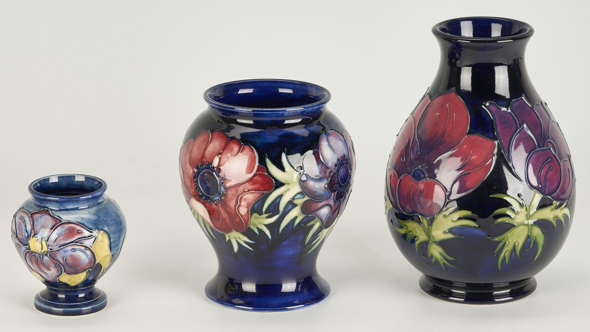 Lot 454: 6 Moorcroft Pottery Vases,  Anemone, Mini Flambe Big Poppy