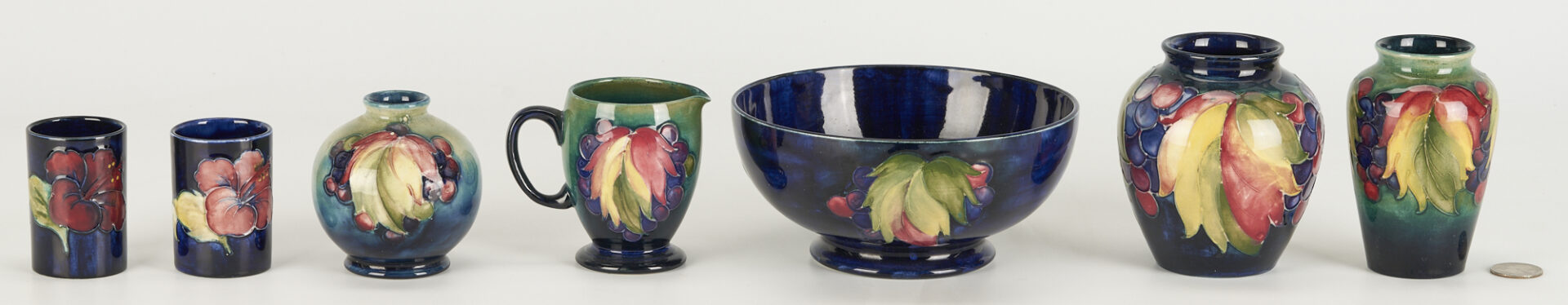 Lot 458: 7 Moorcroft Pottery Items, incl. Leaf & Berry and Hibiscus