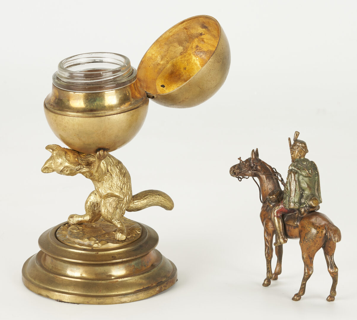 Lot 645: Bronze Fox inkwell Plus Cold Painted Bronze Soldier on Horseback