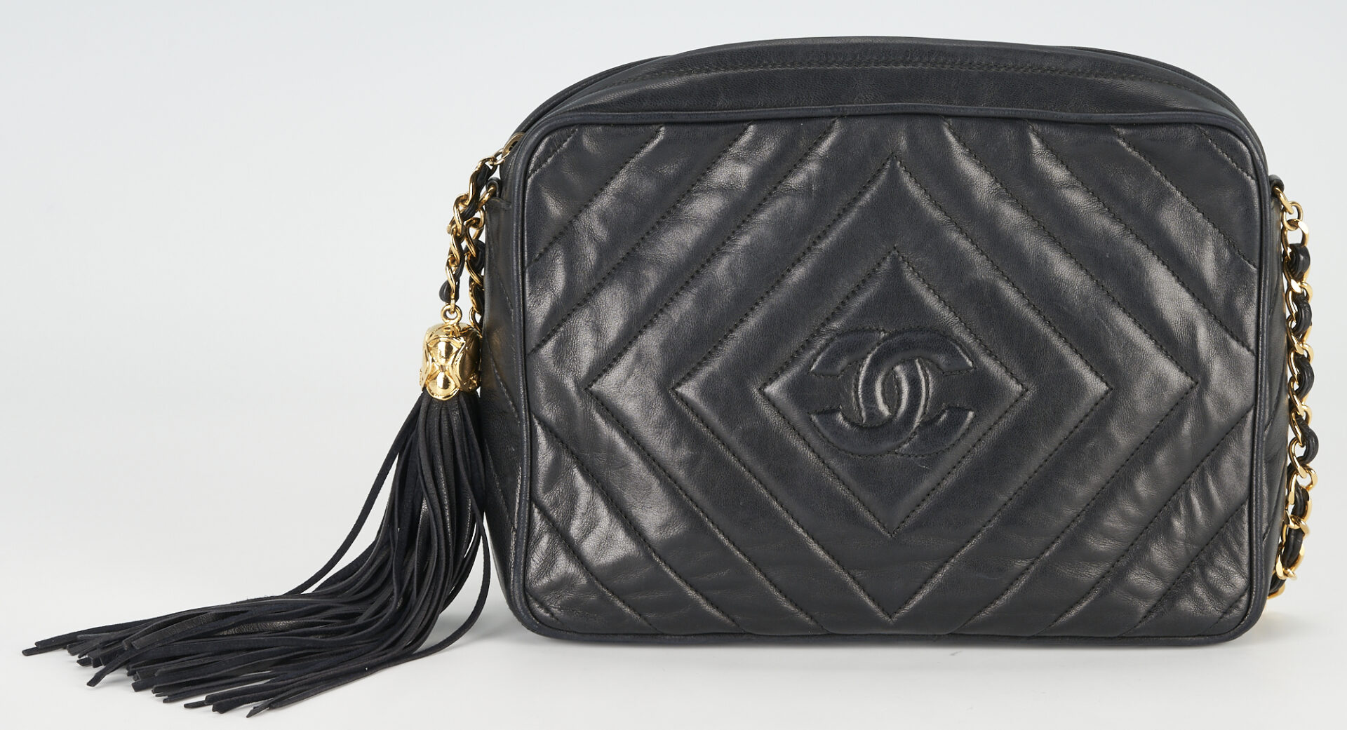 Lot 95: Vintage Chanel Black Quilted Lambskin Bag