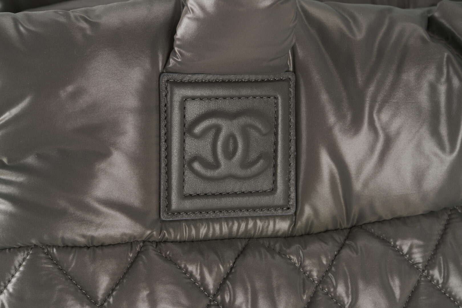 Lot 97: Chanel Grey Logo Cocoon Tote