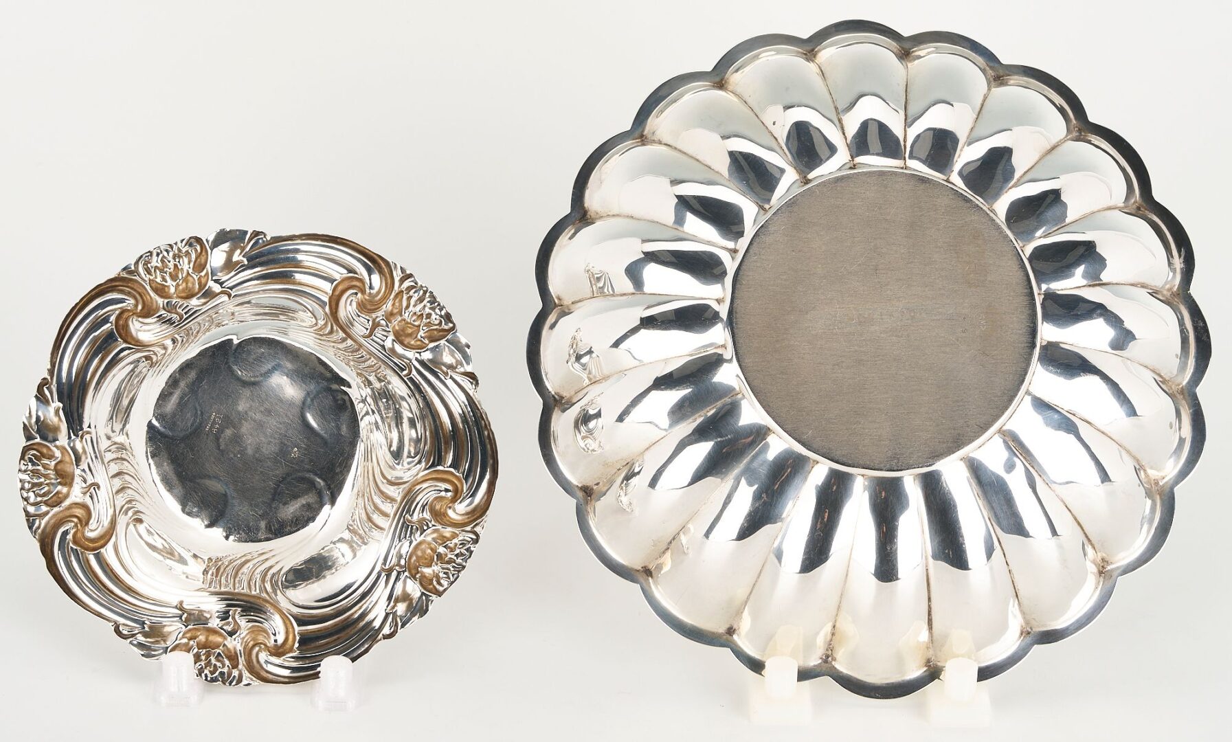 Lot 1055: 3 pcs. Sterling Hollowware, incl.  Floral Footed Plate