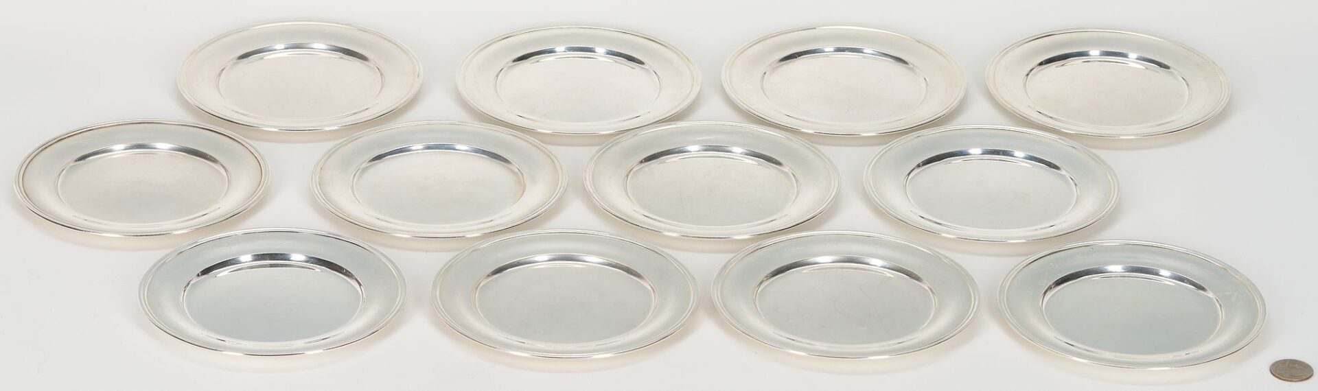 Lot 1063: 12 S. Kirk & Son Sterling Bread Plates