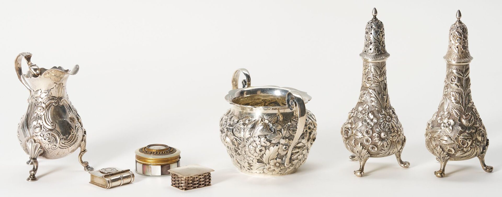 Lot 1070: 7 Items incl. Sterling Repousse Shakers, Snuff or Pill Boxes