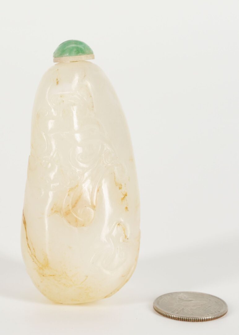 Lot 17: Chinese Carved White Jadeite Snuff Bottle