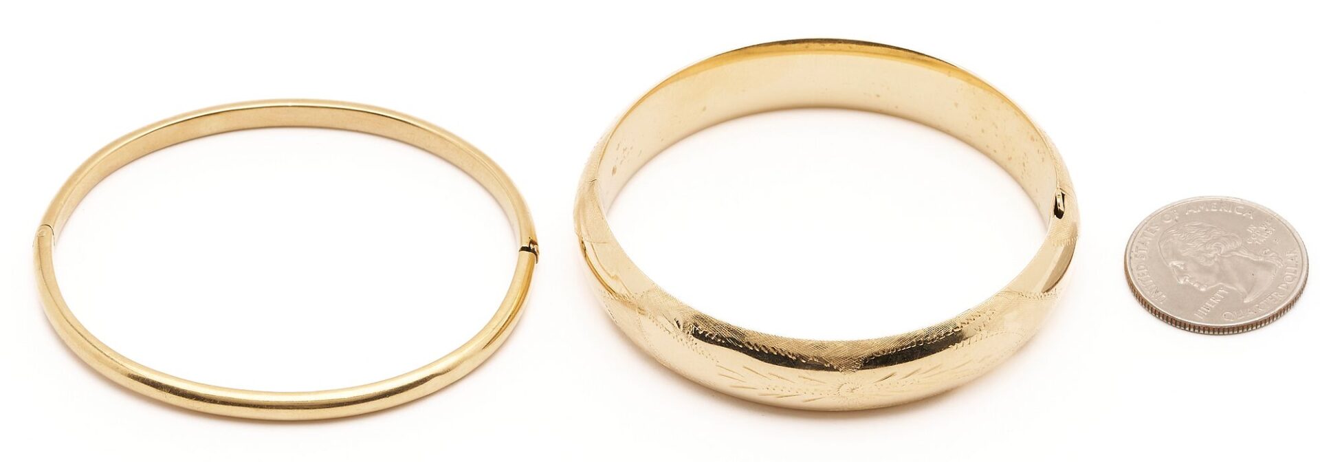 Lot 628: Two (2) 14K Gold Bangle Bracelets