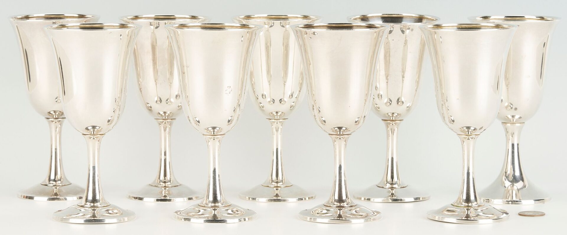 Lot 698: 9 Sterling Silver Water Goblets