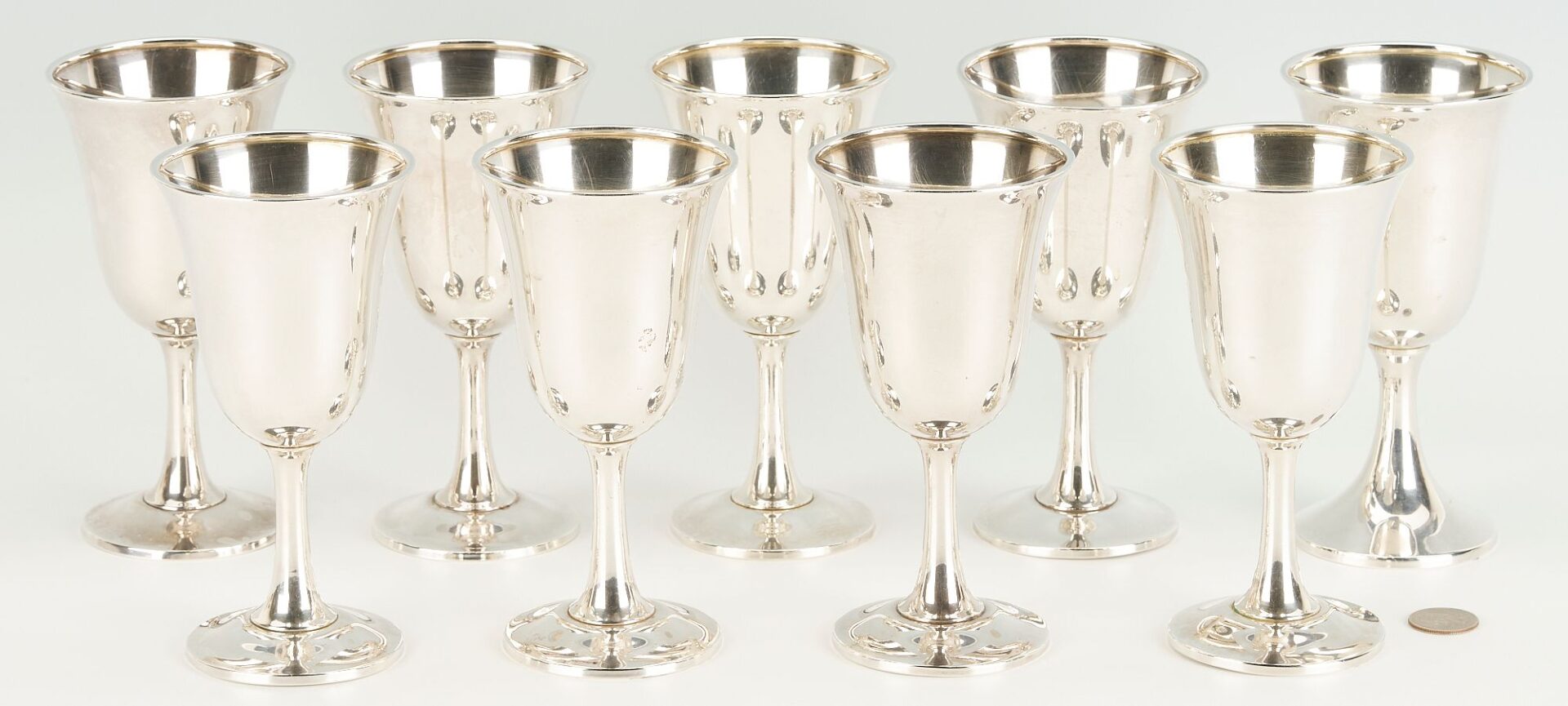 Lot 698: 9 Sterling Silver Water Goblets