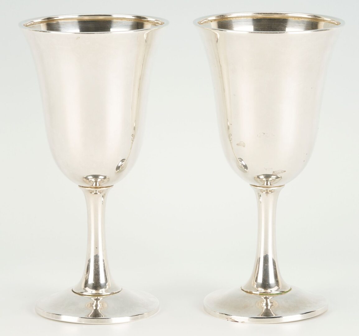 Lot 698: 9 Sterling Silver Water Goblets