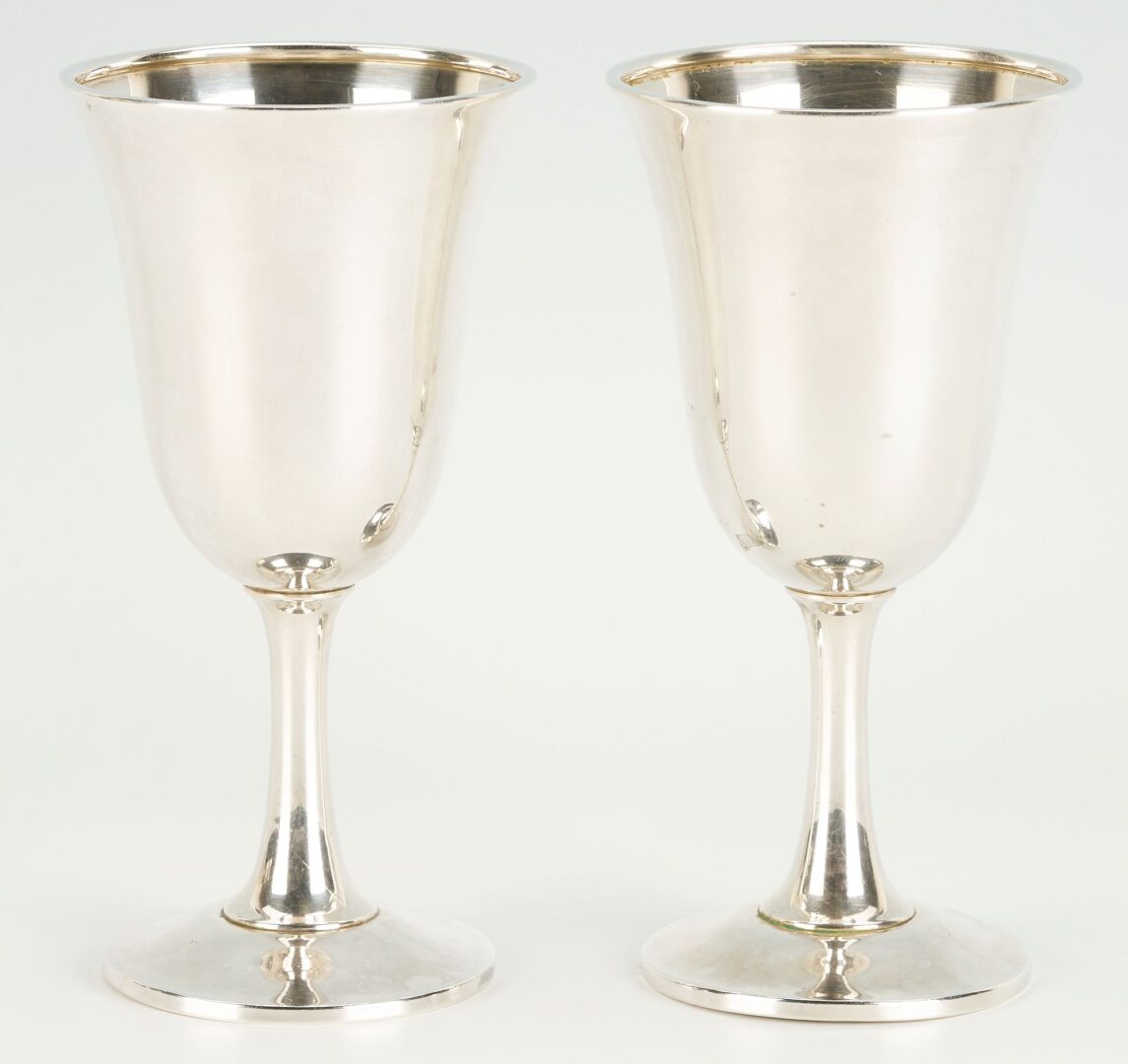 Lot 698: 9 Sterling Silver Water Goblets