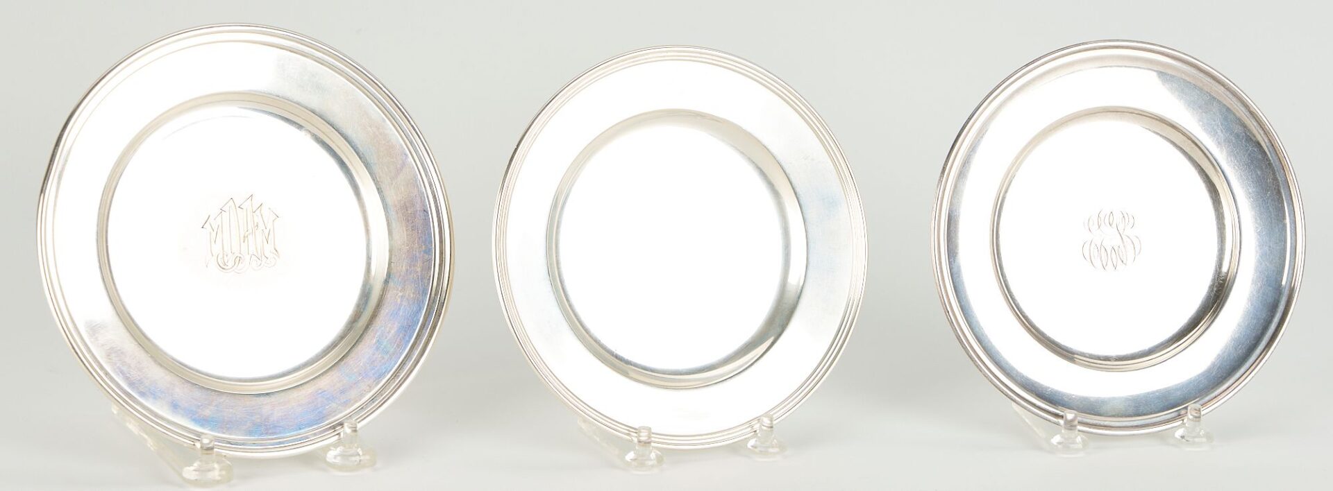 Lot 707: 19 Assembled Sterling Silver Bread Plates