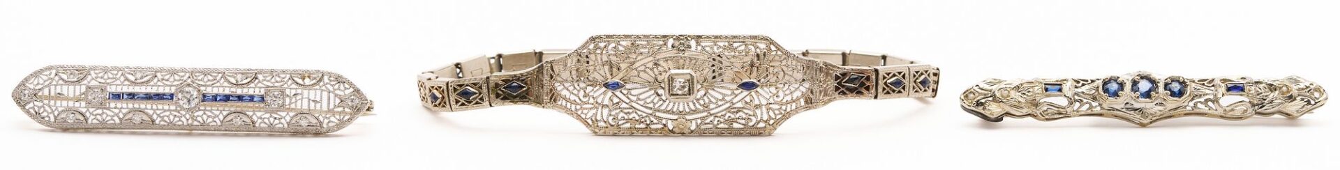 Lot 729: 14K White Gold Art Deco Bracelet and two (2) Brooches