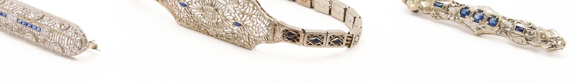 Lot 729: 14K White Gold Art Deco Bracelet and two (2) Brooches