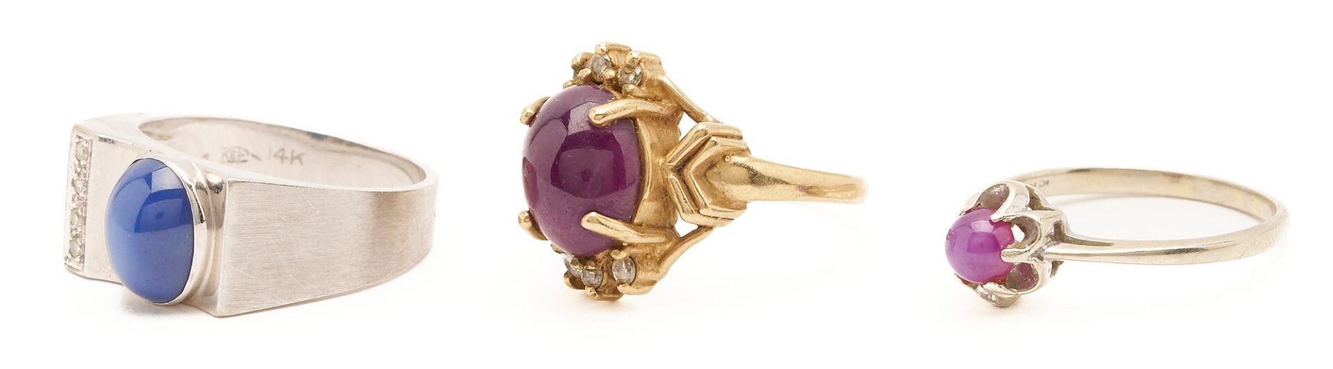 Lot 845: Two Gold & Cabochon Ruby Rings and one Gold & Sapphire Ring