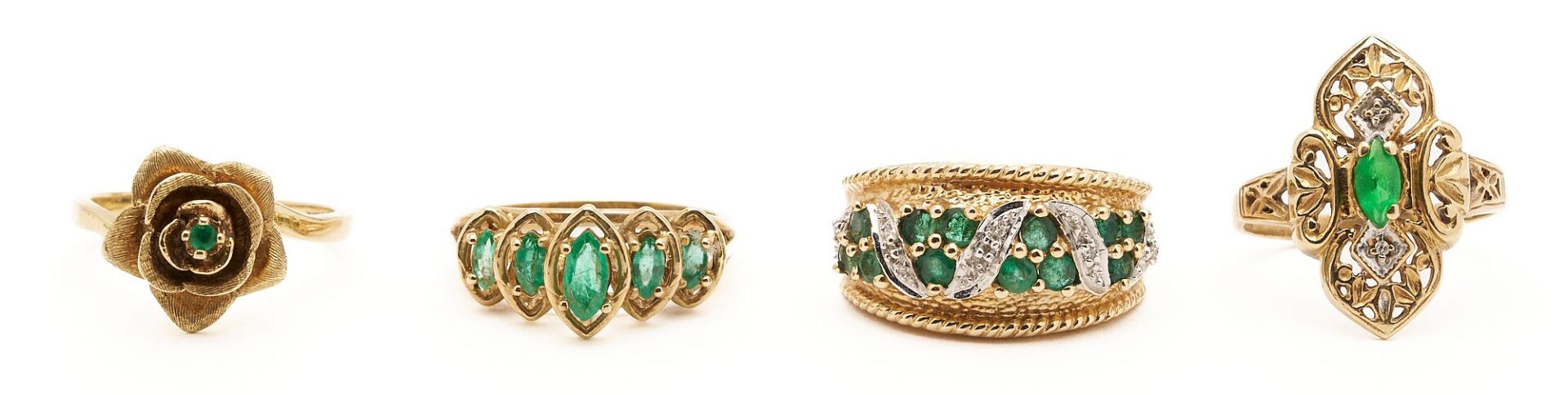 Lot 860: Four Gold and Green Gemstone Rings