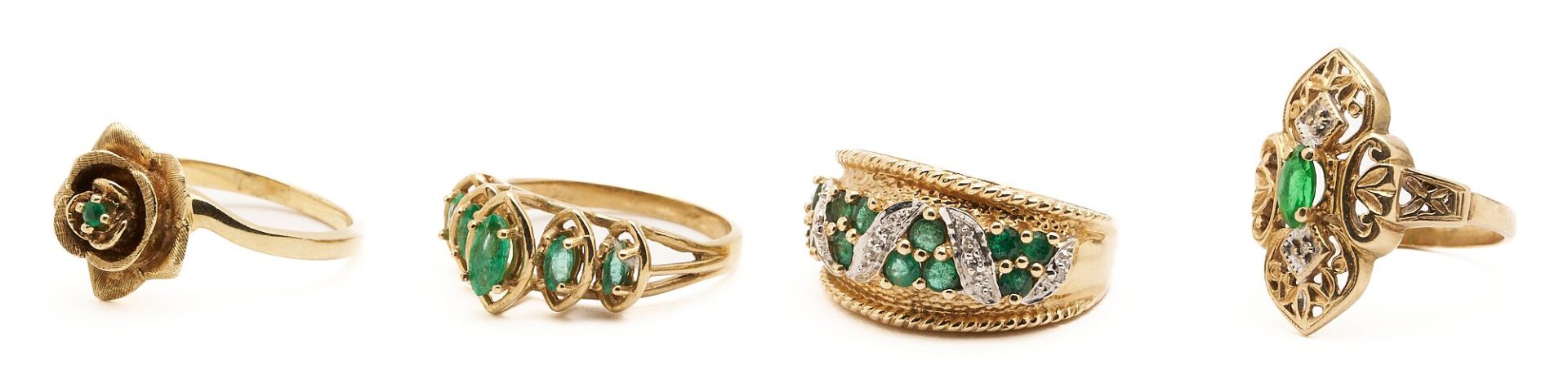 Lot 860: Four Gold and Green Gemstone Rings