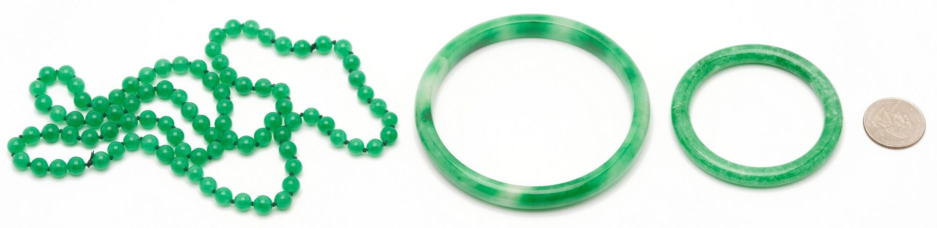 Lot 870: 2 Apple Green Jade Bangle Bracelets plus Beads