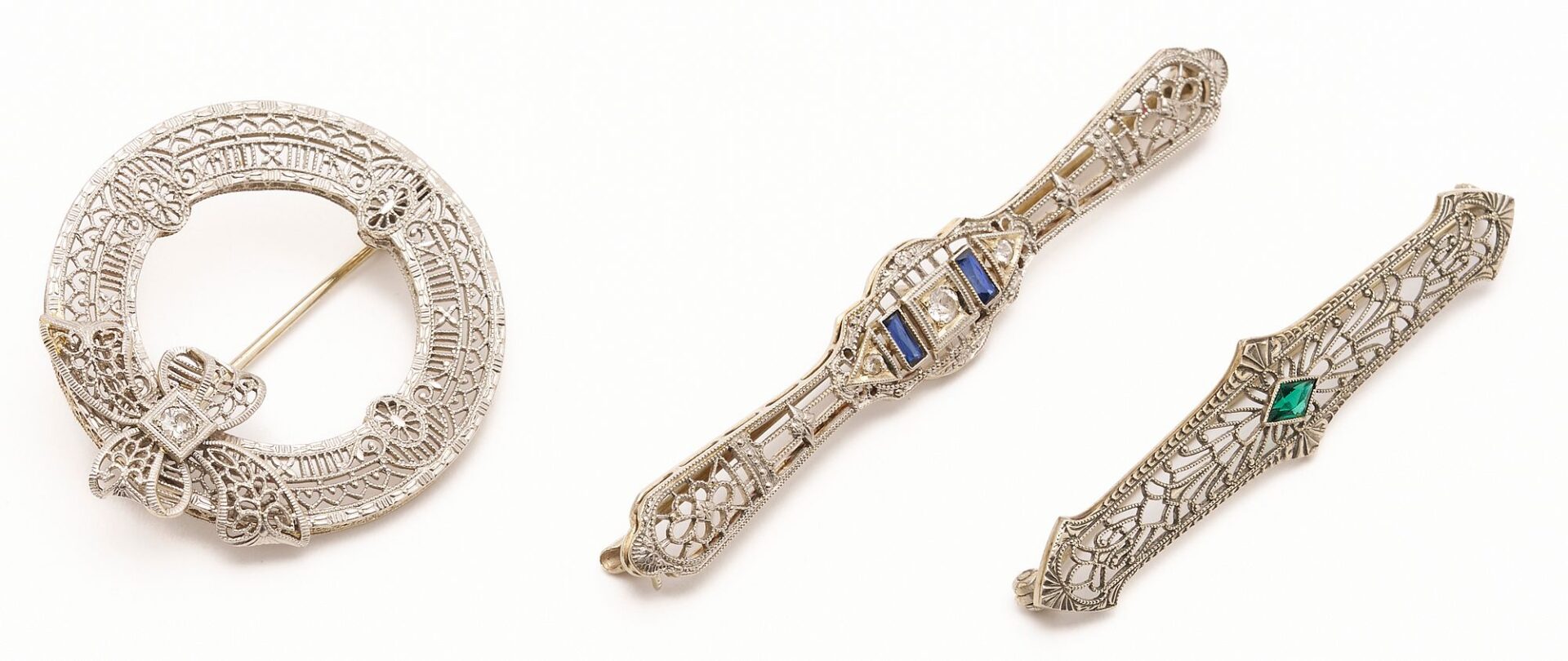 Lot 967: Three (3) White Gold & Gemstone Filigree Brooches