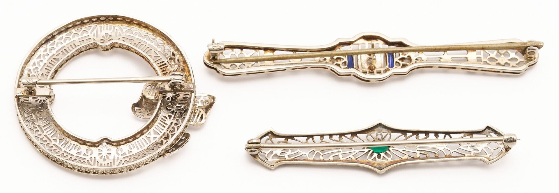 Lot 967: Three (3) White Gold & Gemstone Filigree Brooches