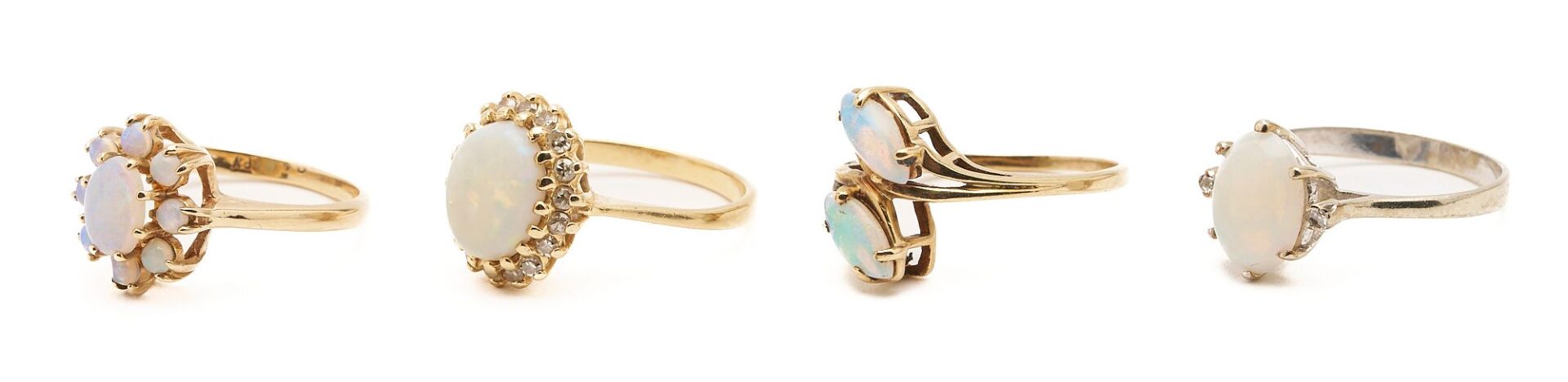 Lot 969: Four Gold & Opal Rings